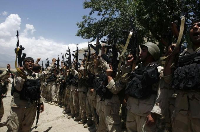 Afghanistan security forces celebrate their victory after a Taliban attack near Kabul