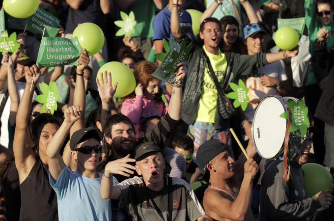 Small South American nation is the world's first to allow its citizens to grow, buy and smoke marijuana [Reuters]