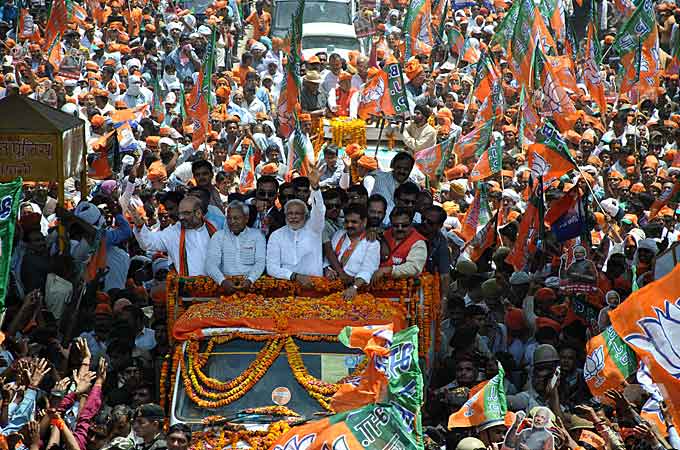 Whether a Modi-led government will be able to dodge the downside of high expectations is an open question [AFP]