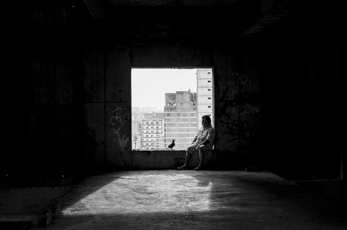 Luis Alfonso is among the last remaining residents in La Torre David in Caracas [Alejandro Cegarra/Al Jazeera] 