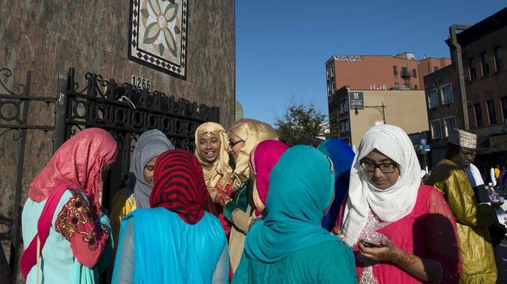 Young women and girls are seen after Eid Al-Adha prayers outside the Masjid At-Taqwa mosque in New York [REUTERS]