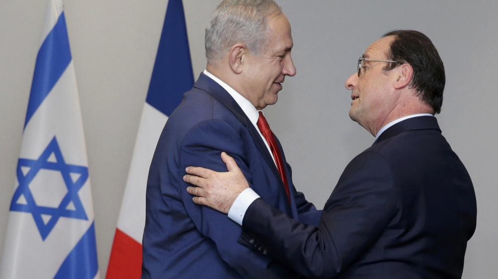 French President Hollande greets Israel''s Prime Minister Netanyahu during a bilateral meeting on the opening day of the World Climate Change Conference 2015 at Le Bourget, near Paris
