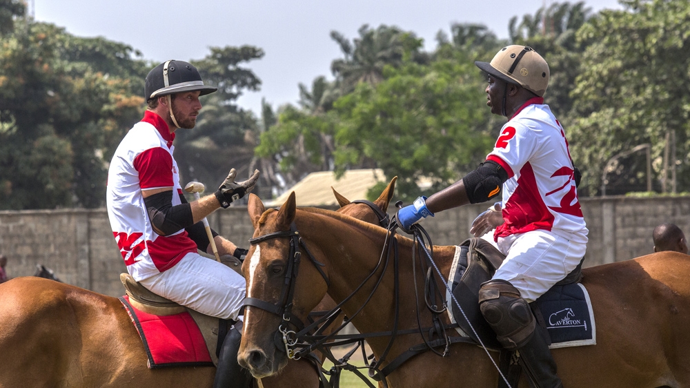 Bode Makanjuola, right, and Leroux Hendriks during a game [Andrew Esiebo/Al Jazeera]