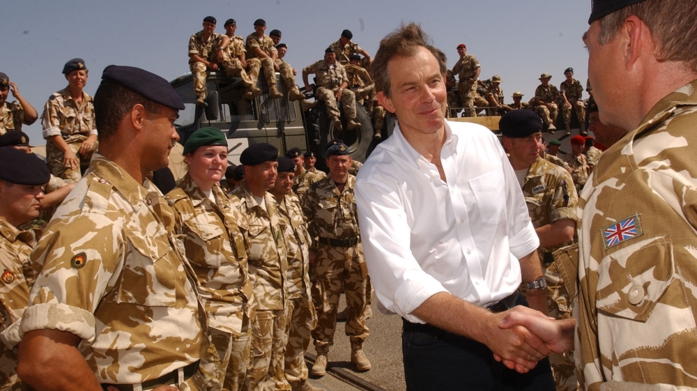 File photo of British Prime Minister Tony Blair meeting troops in Iraq