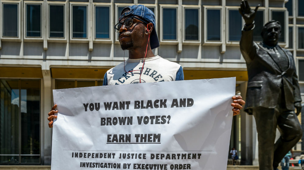 Activists have urged Clinton to work on having police killings stopped to deserve their votes [Getty Images]