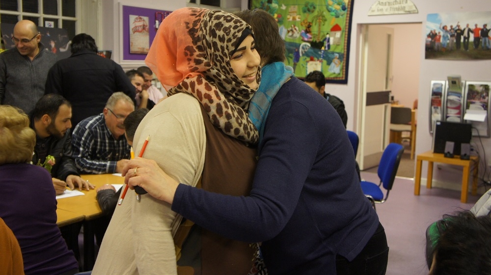 Local volunteers are key to the 'Family Nest' project, set up to help Syrian refugees socialise with the community [Zab Mustefa/Al Jazeera]
