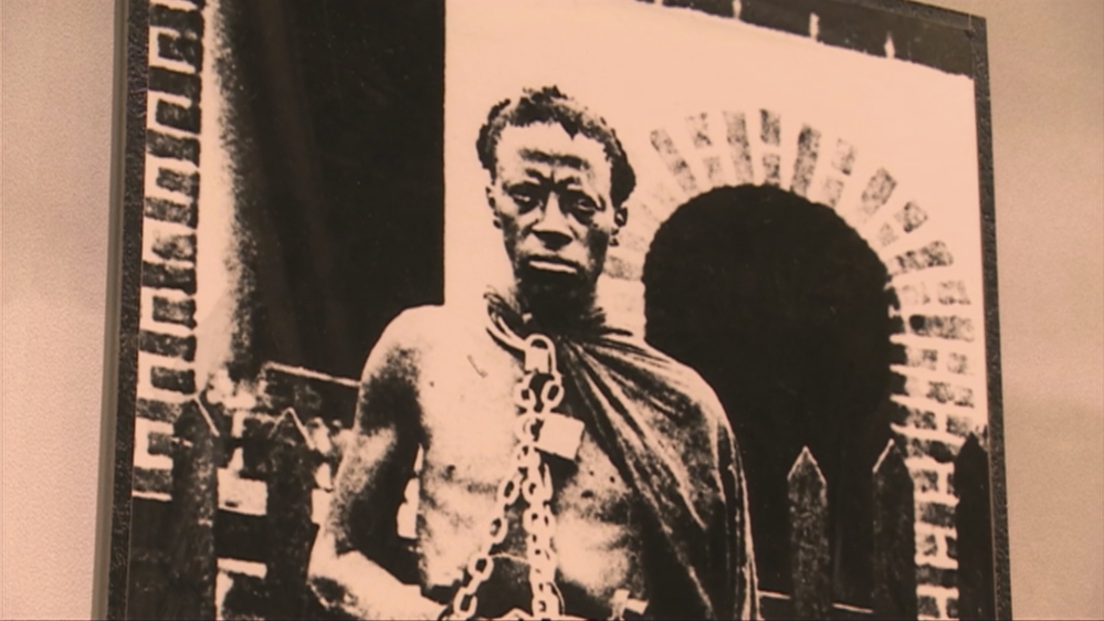 Picture of a Namibian tribesman shackled and chained by German colonialists