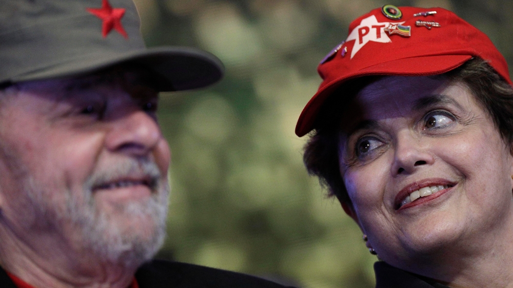 Former Brazilian President Luiz Inacio Lula da Silva (L) and Former Brazilian President Dilma Rousseff