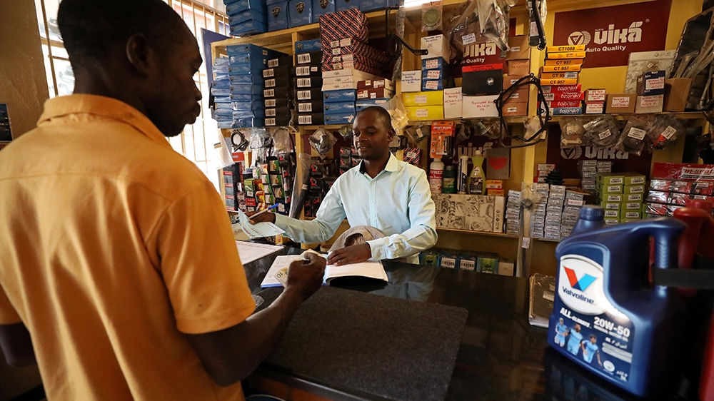 Zimbabwe image of men in shop