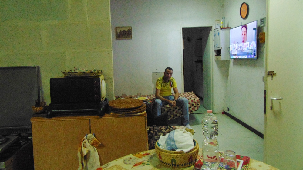 An apartment in Viale del Caravaggio where Jamal, a Moroccan greengrocer, lives with his wife Naima and their two children
