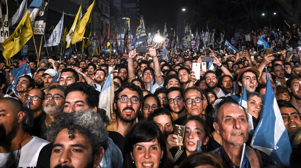 Supporters of Alberto Fernandez and his running mate and former President Cristina Fernandez de Kirchner, celebrate after Alberto Fernandez wins the general election, in Buenos Aires, Argentina Octobe