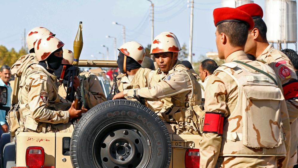 Military forces look on in North Sinai