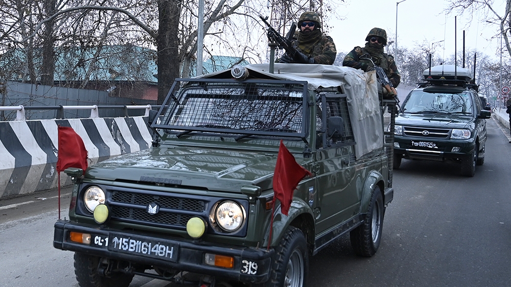 A foreign delegation, including representatives of the United States but not the European Union, is escorted in a convoy in Srinagar on January 9, 2020. (Photo by Tauseef MUSTAFA / AFP)