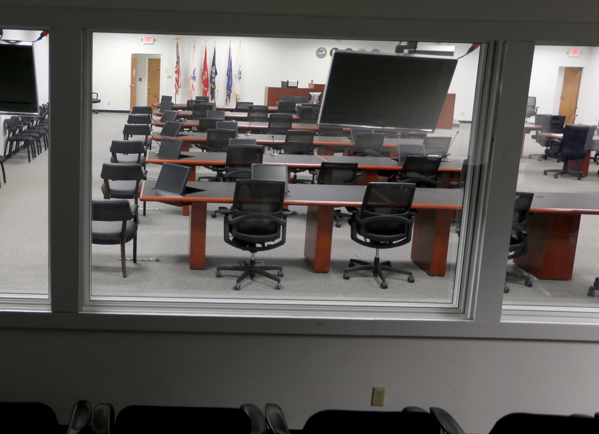 The US military courtroom at Camp Justice seen from behind a glass wall where the media and victims’ families sit to witness the proceedings