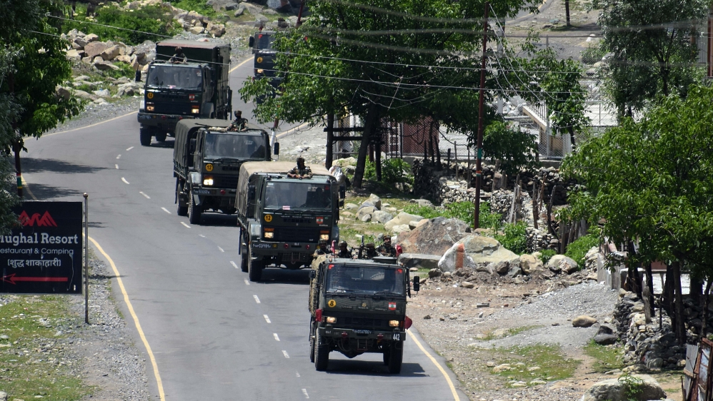 Indian army convoy moves along the Srinagar-Leh National highway towards Ladakh