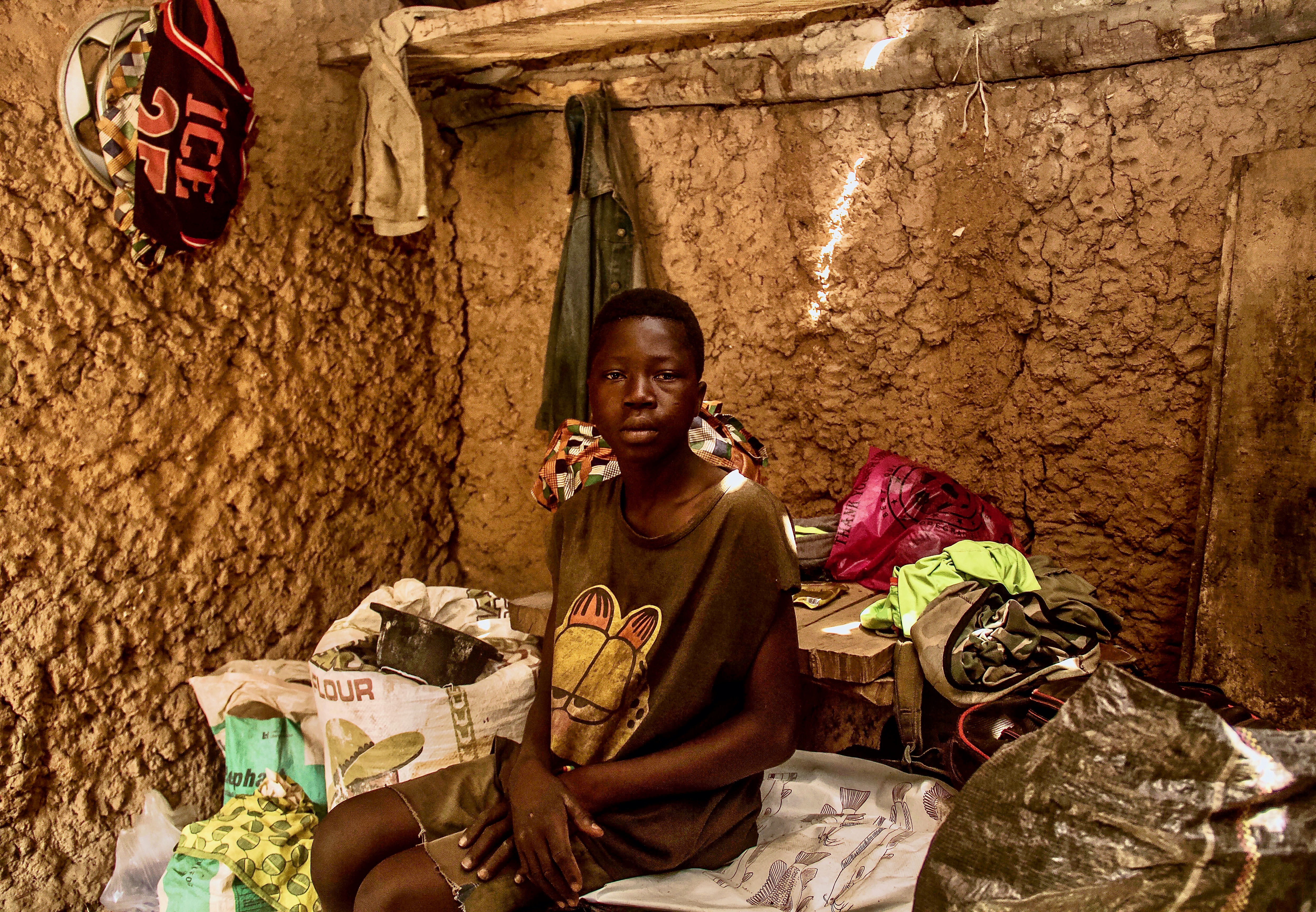 Thirteen-year-old Koffi left Ghana for the first time when he came to Nigeria to work as a farm hand [Femi Amogunla/Al Jazeera]