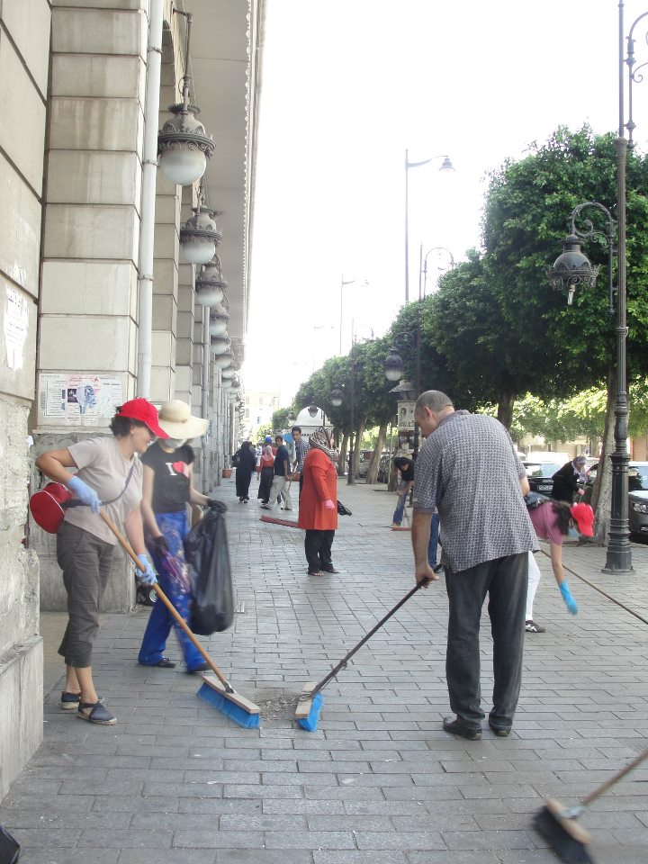 A group of citizens organise a cleanup in the main Habib Bourguiba Avenue a few weeks after the protests in Tunis which drove President Ben Ali to flee the country [Photo courtesy of Samia Fitouri]