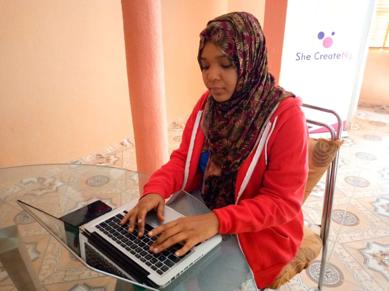 Sa'adat Aliyu launched Helpio on Android phones to allow sexual assault victims to report crimes anonymously [Sa'adat Aliyu/Al Jazeera]