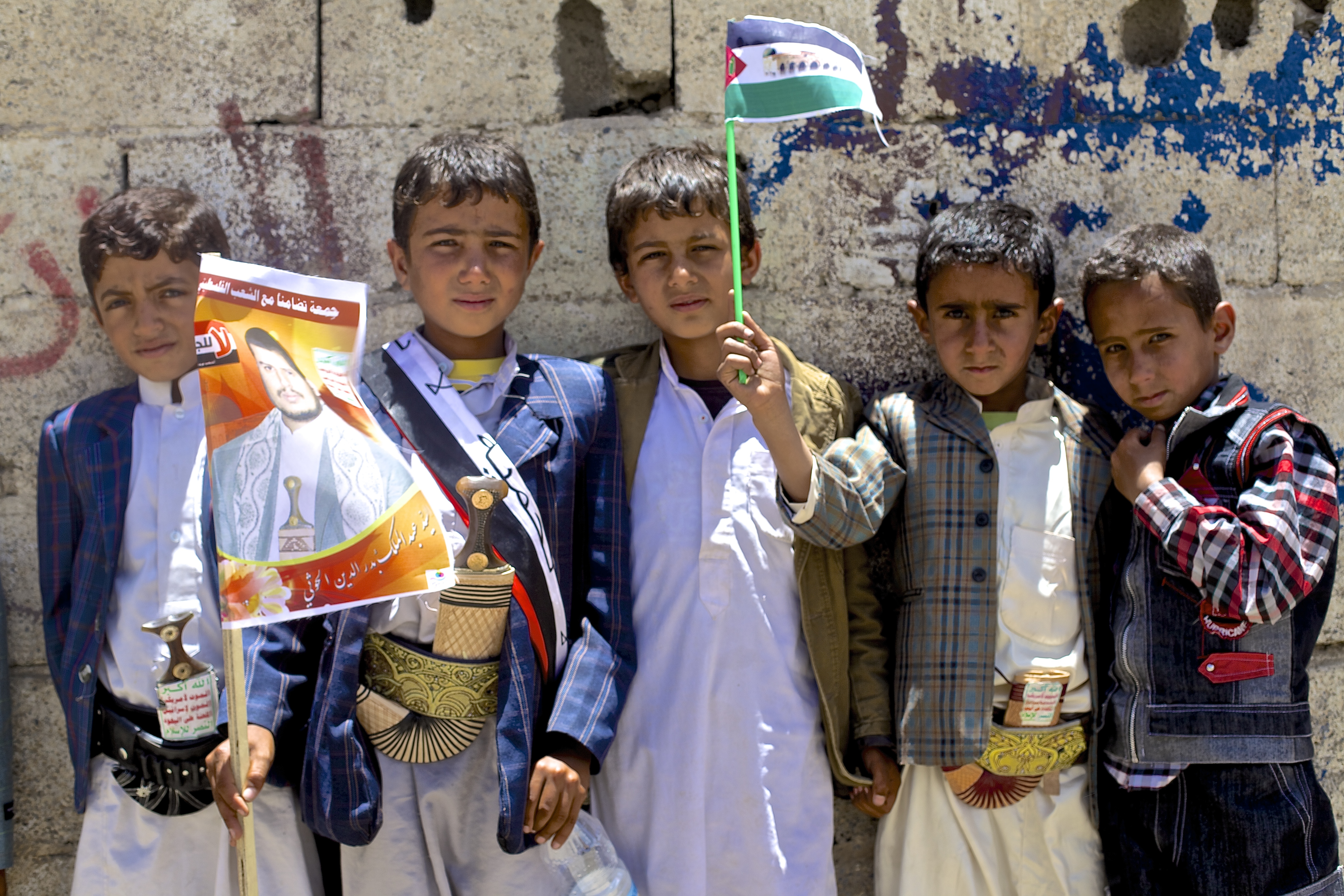Children join a protest in Change Square, Sana’a, in August 2014 before president Abdrabbuh Mansur Hadi left the country [Laura Silvia Battaglia/Al Jazeera]