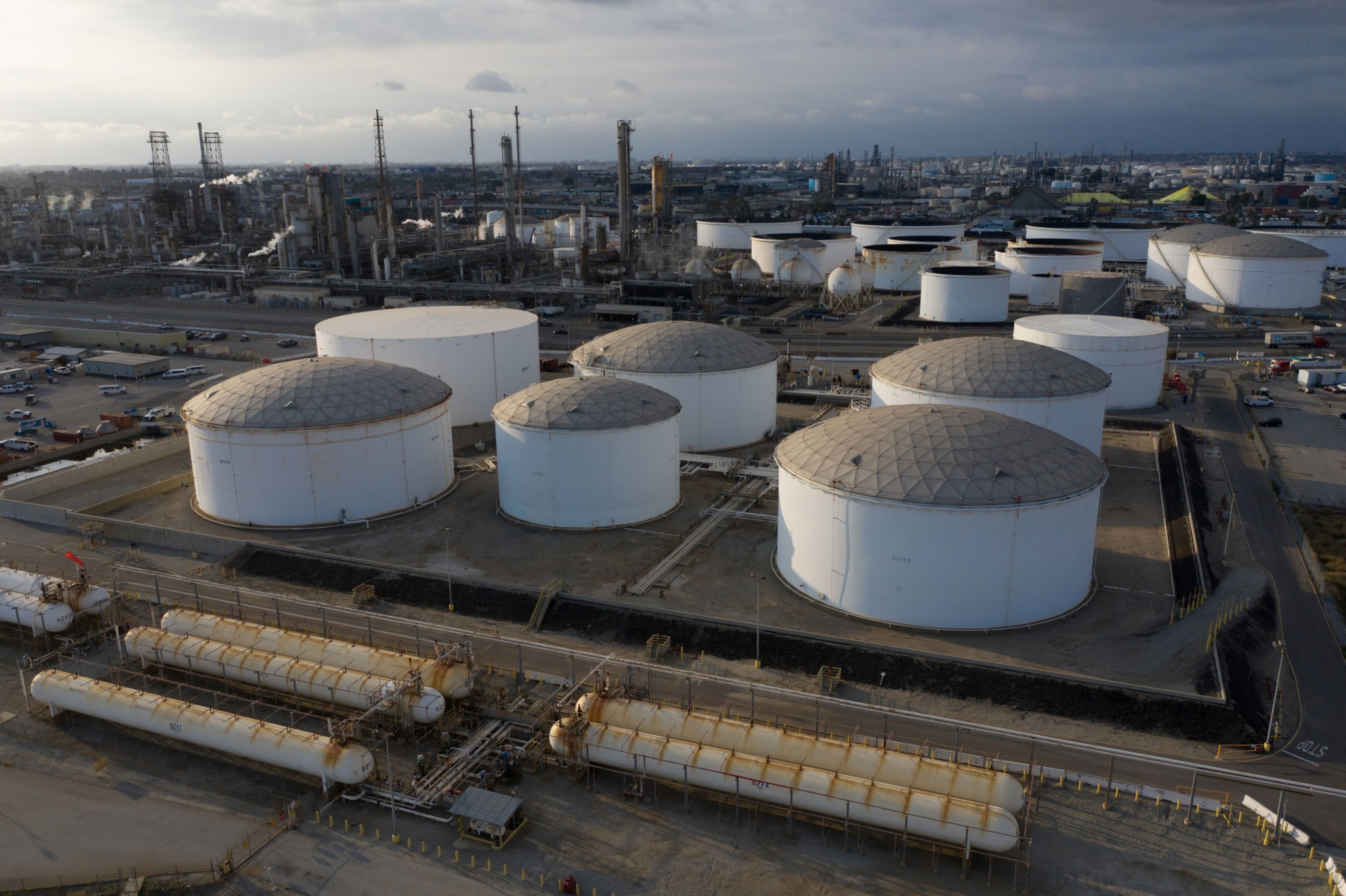 Crude futures' decline pushed the benchmark to close below its 50-day moving average for the first time since late April, a bearish signal that may invite more sellers into the market [File: Bing Guan/Bloomberg]