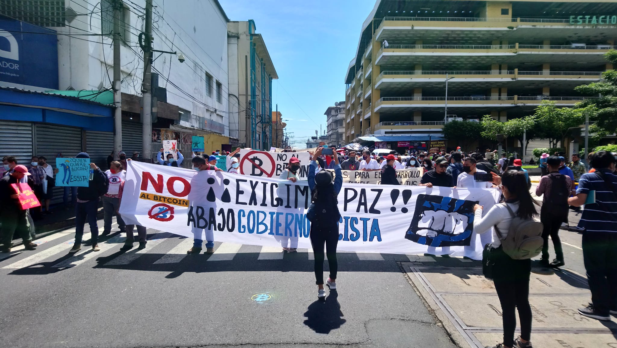 As the government grappled with technical problems, a small but growing group of people opposed to the new Bitcoin law turned out to protest it in the capital San Salvador [Courtesy of John Dennehy]