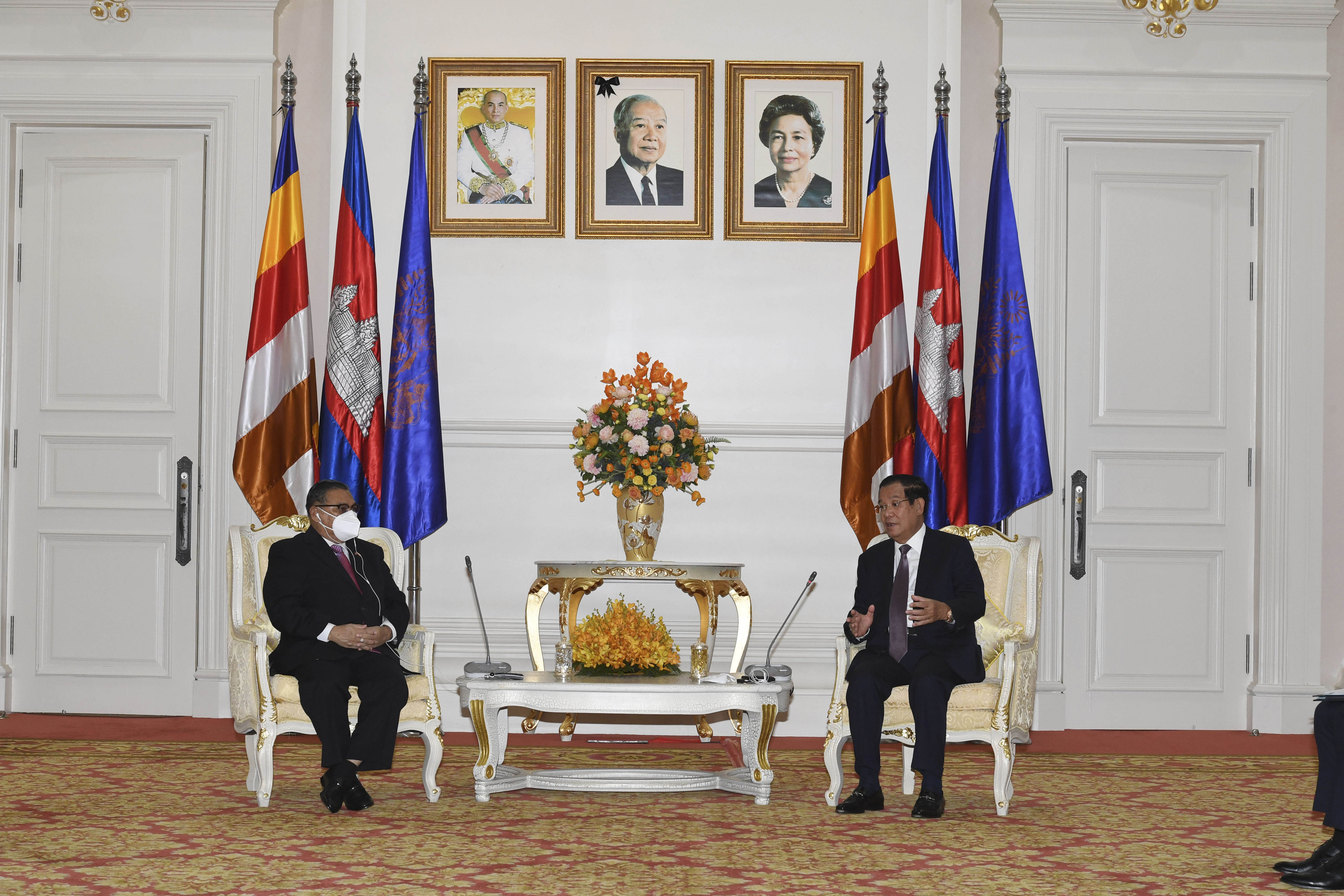 Cambodian Prime Minister Hun Sen, right, talks with Myanmar’s military-appointed Foreign Minister Wunna Maung Lwin at Peace Palace in Phnom Penh, Cambodia, December 7, 2021