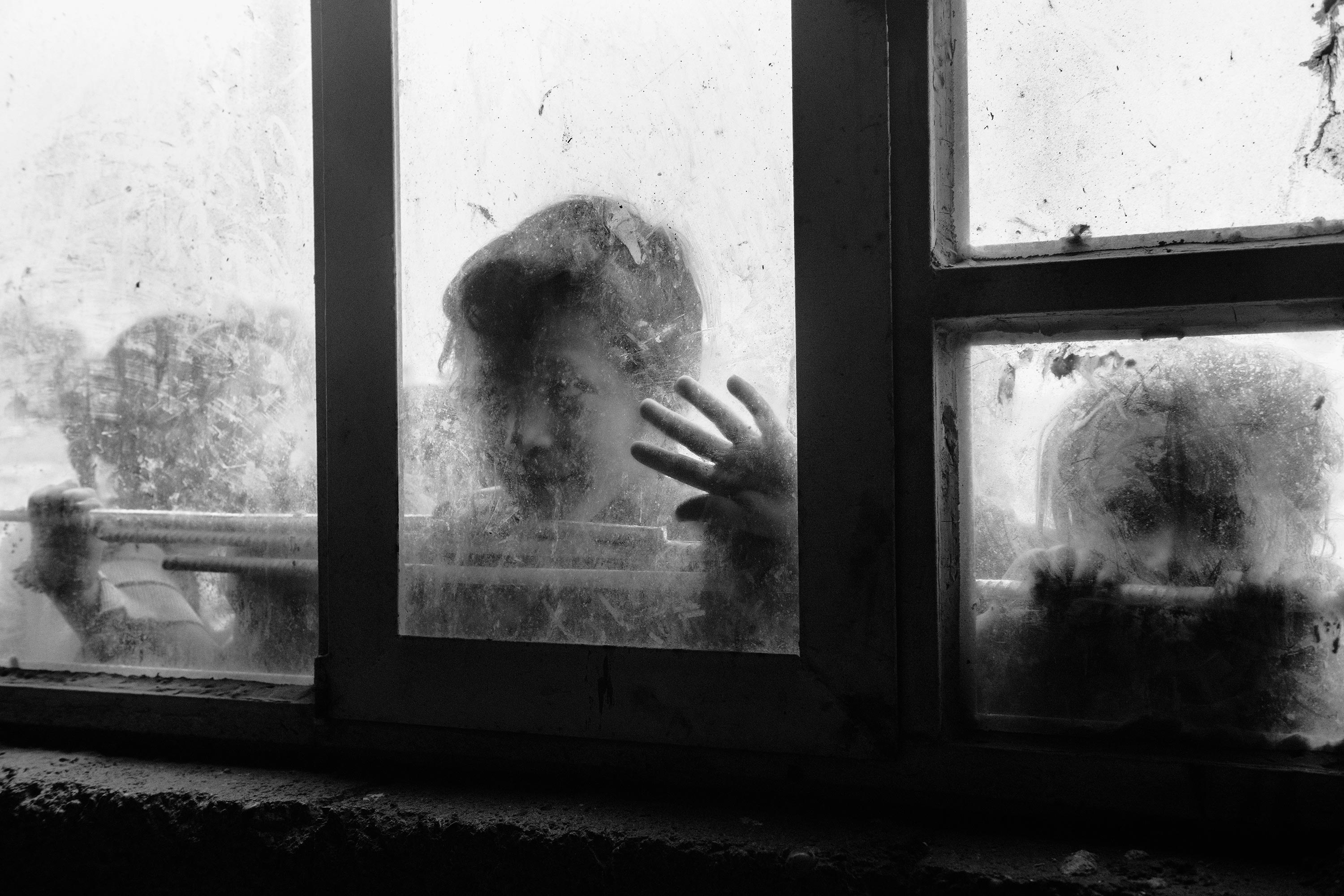 Iraq, Baiji. Children playing at the window of a newly built house in Baiji, in Salah ad Din governorate. The outskirts of the city were the scene of particularly cruel fights between the Iraqi army and Islamic State militants.