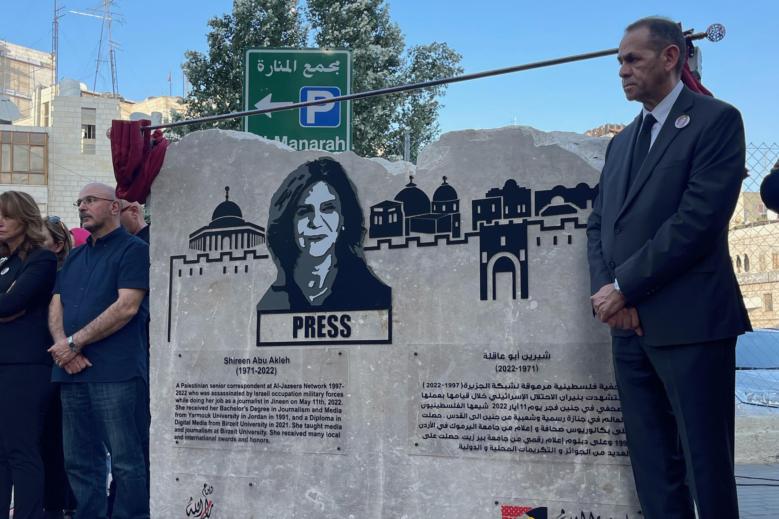 Brother of Shireen, Anton Abu Akleh standing near the memorial of Shireen unveiled on Wednesday in Ramallah