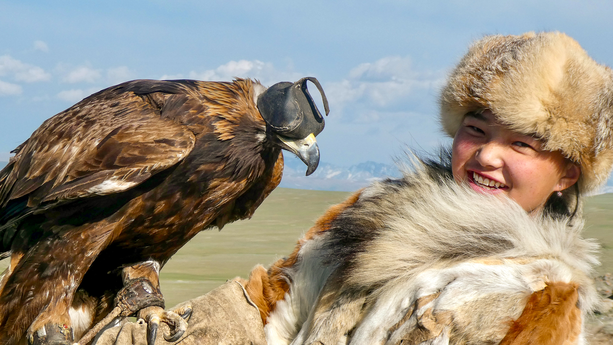 A Kazakh girl with an eagle