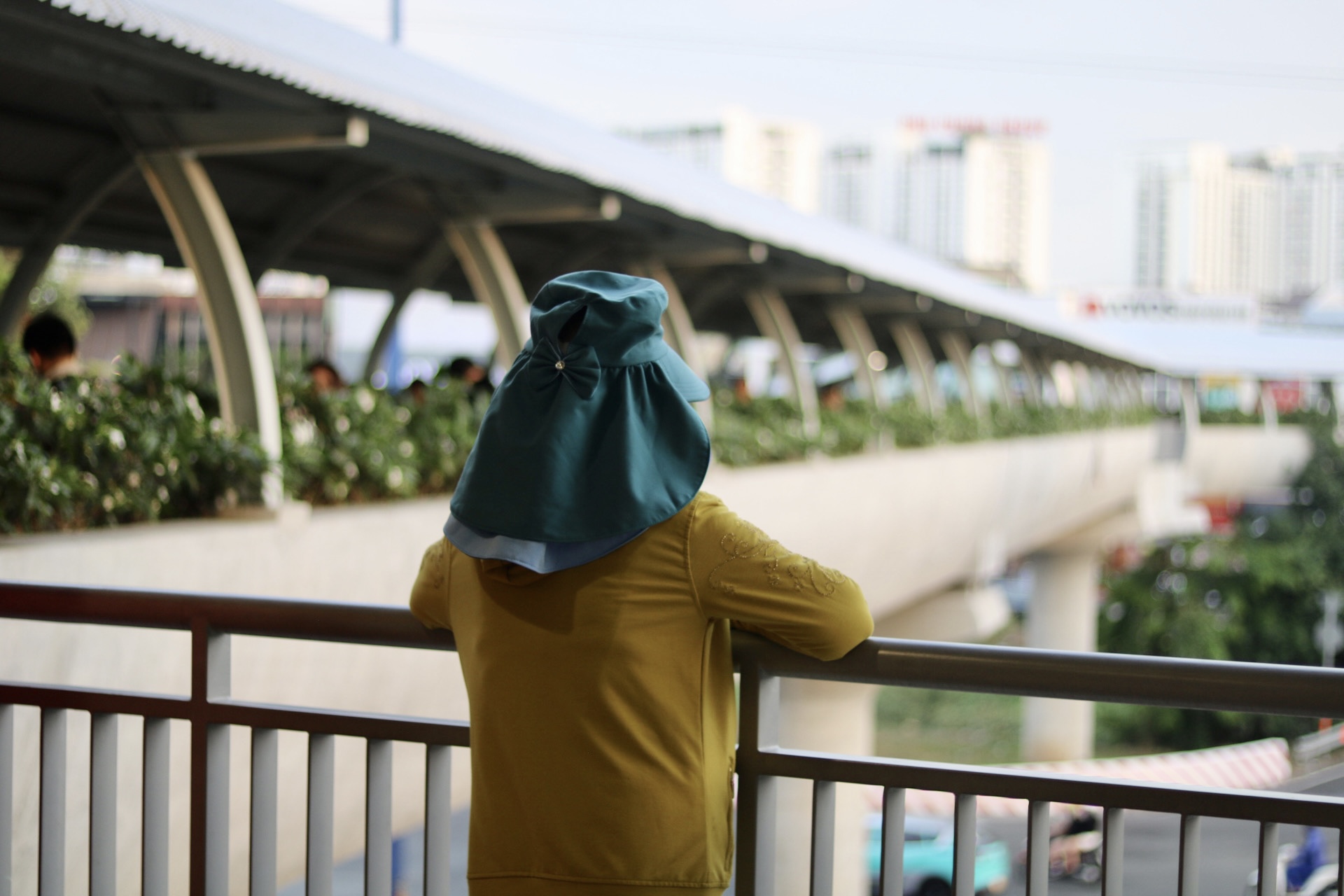 A woman stands at a metro station in Ho Chi Minh City, Vietnam, on March 30, 2025