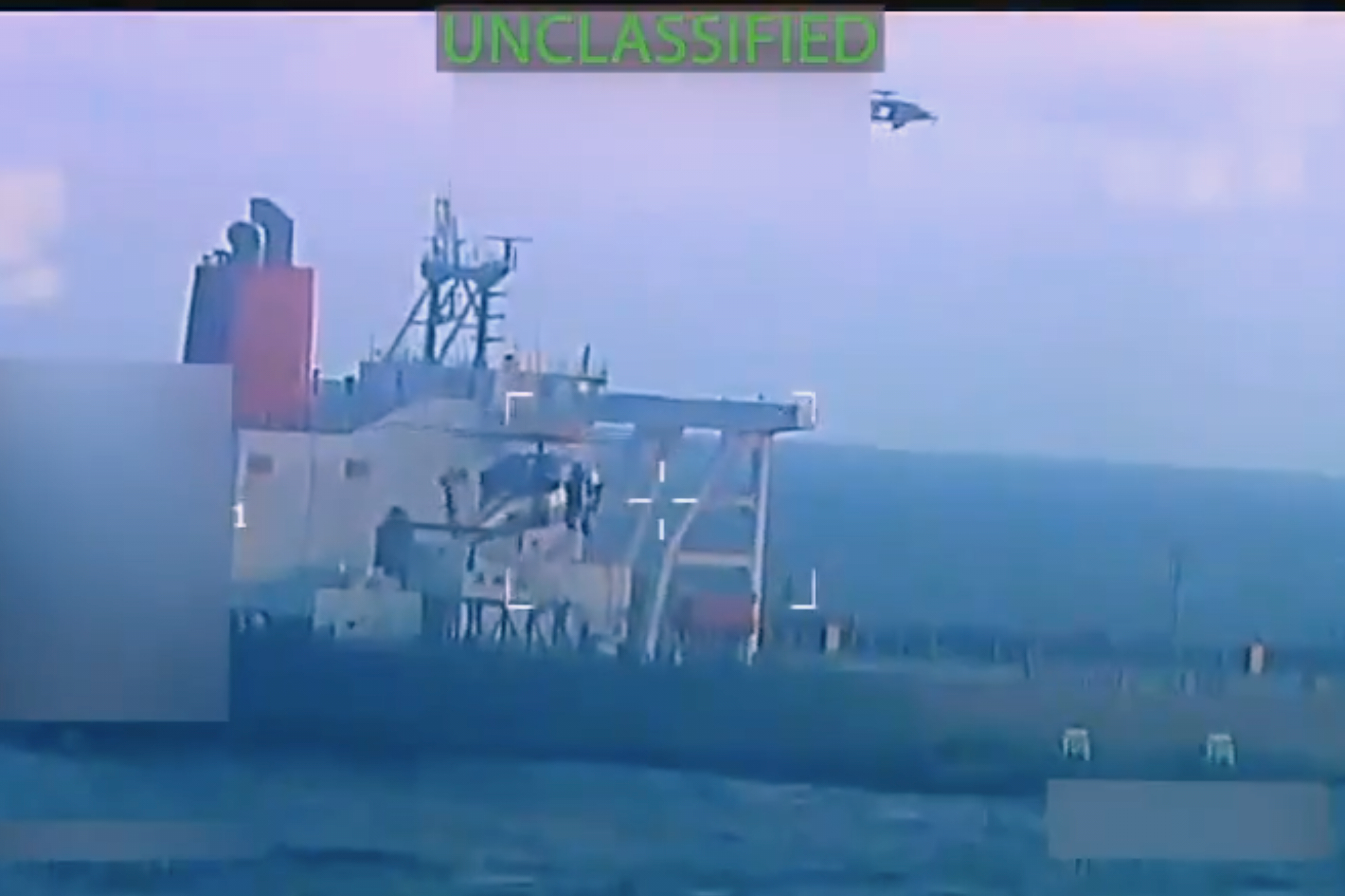 This image from video posted on Attorney General Pam Bondi's X account, and partially redacted by the source, shows an oil tanker being seized by U.S. forces off the coast of Venezuela, Wednesday, Dec. 10, 2025. (U.S. Attorney General's Office/X via AP)