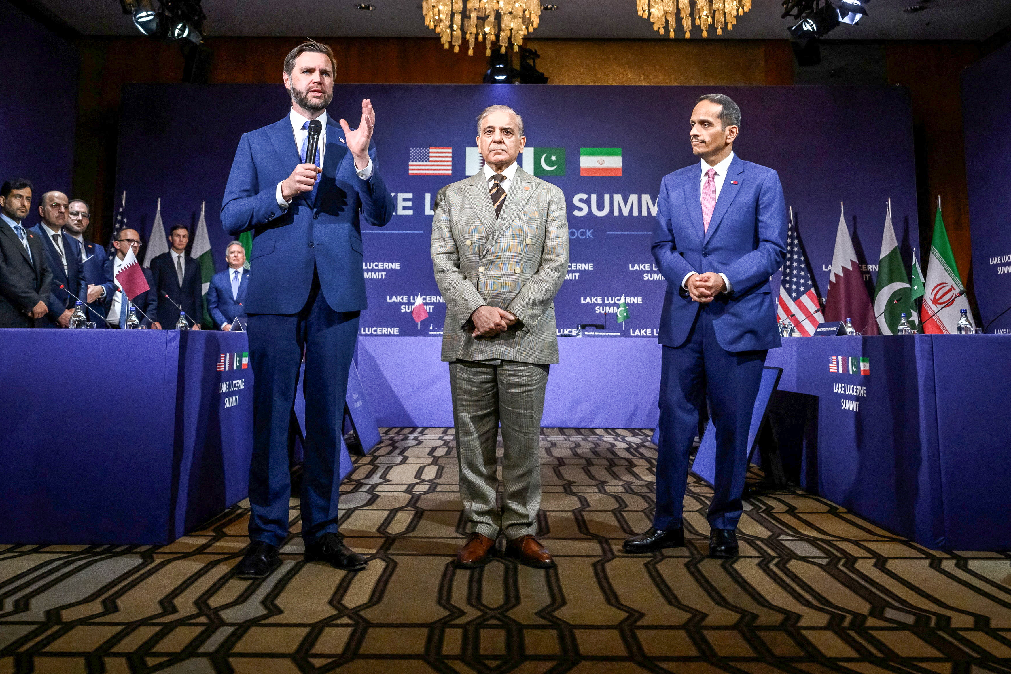 US Vice President JD Vance speaks next to Pakistan’s Prime Minister Shehbaz Sharif and Qatar’s Prime Minister Sheikh Mohammed bin Abdulrahman bin Jassim Al Thani at the start of a meeting between the US, Iran, Pakistan and Qatar at the Burgenstock hotel overlooking Lake Lucerne, Switzerland, on June 21