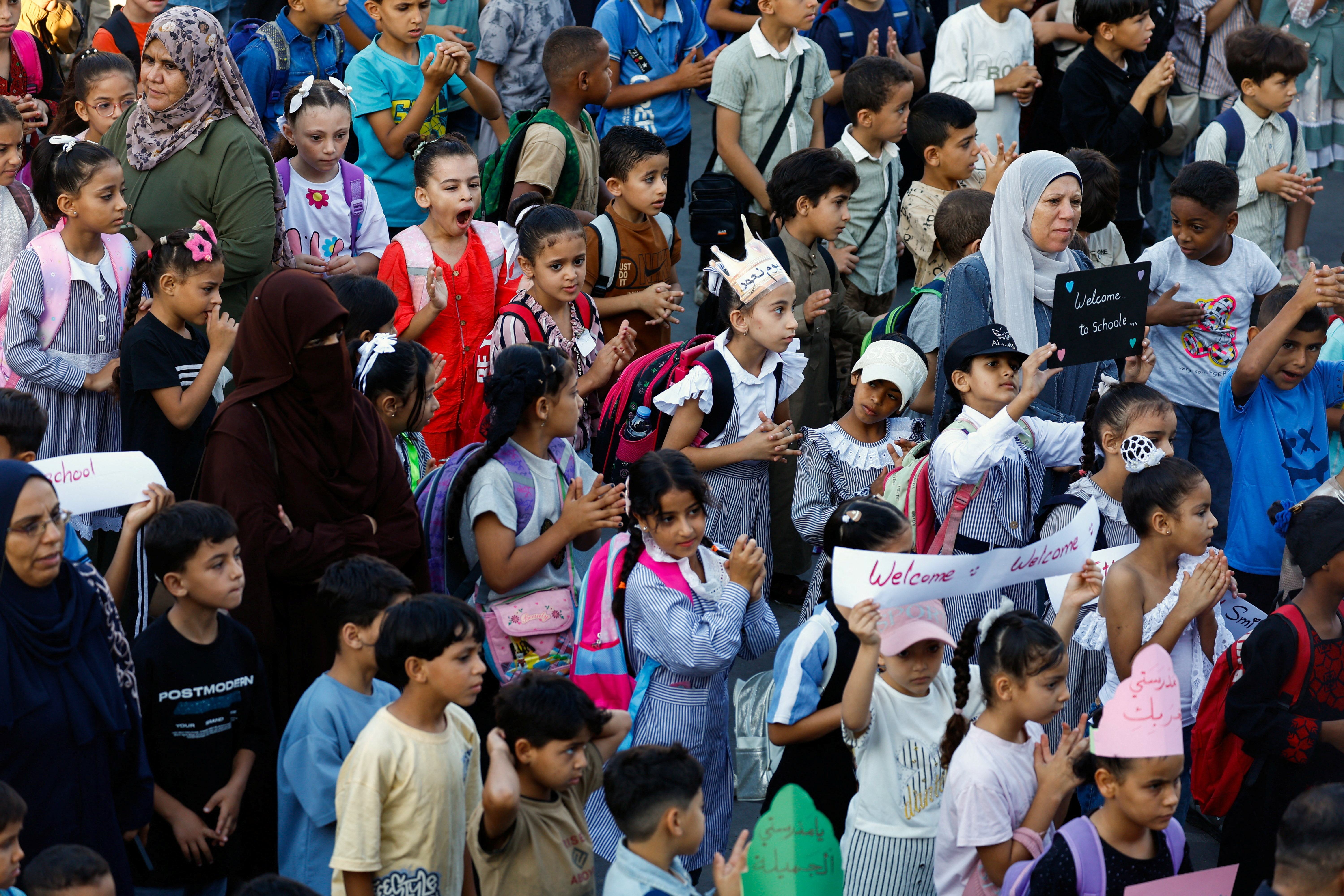 Palestinian students attend their first day of the new school year at an UNRWA school, in Nuseirat, in the central Gaza Strip, September 19, 2026 [Mahmoud Issa/Reuters]