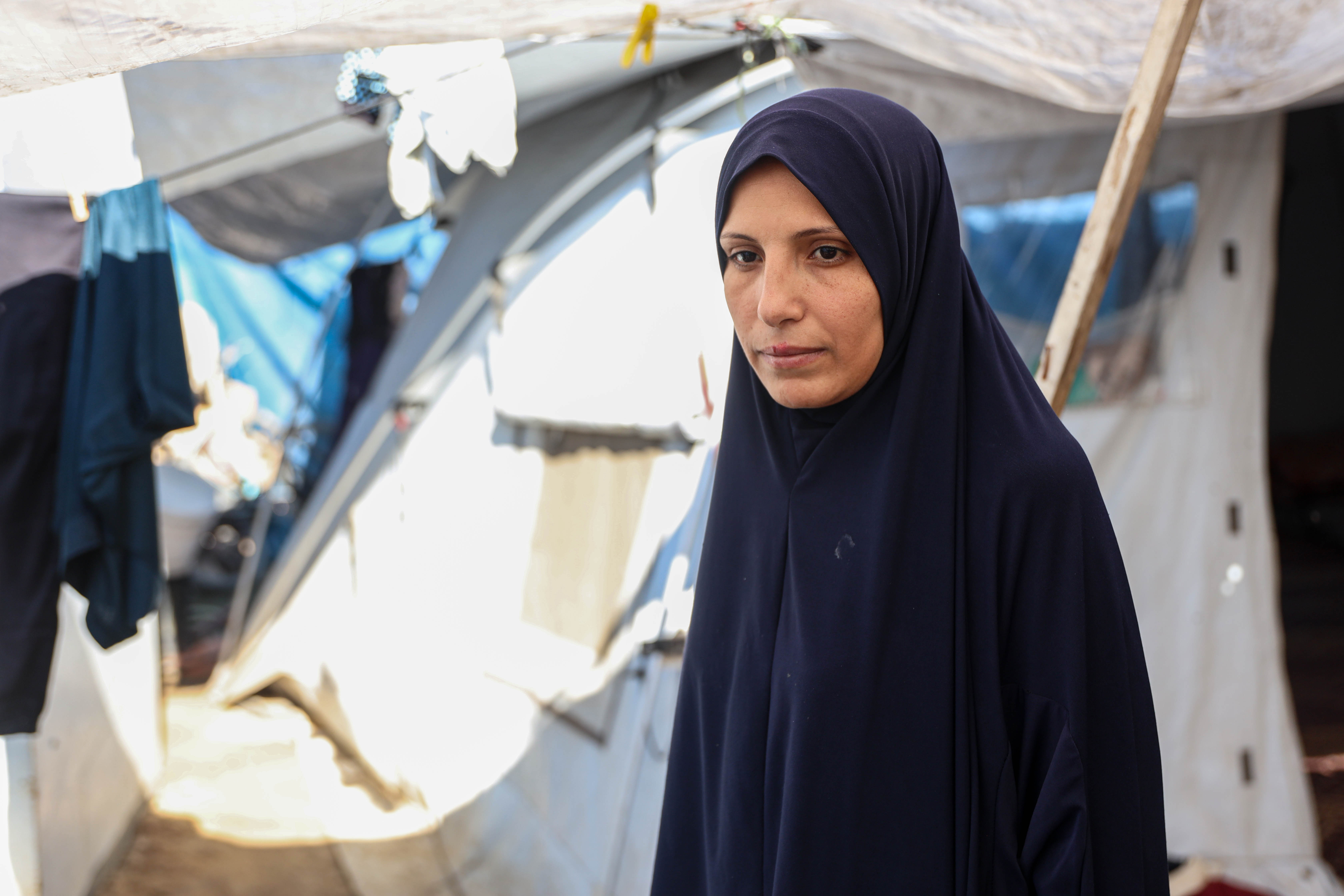 Randa al-War, a displaced mother of three, says her family depends on food parcels to survive amid growing fears of hunger.