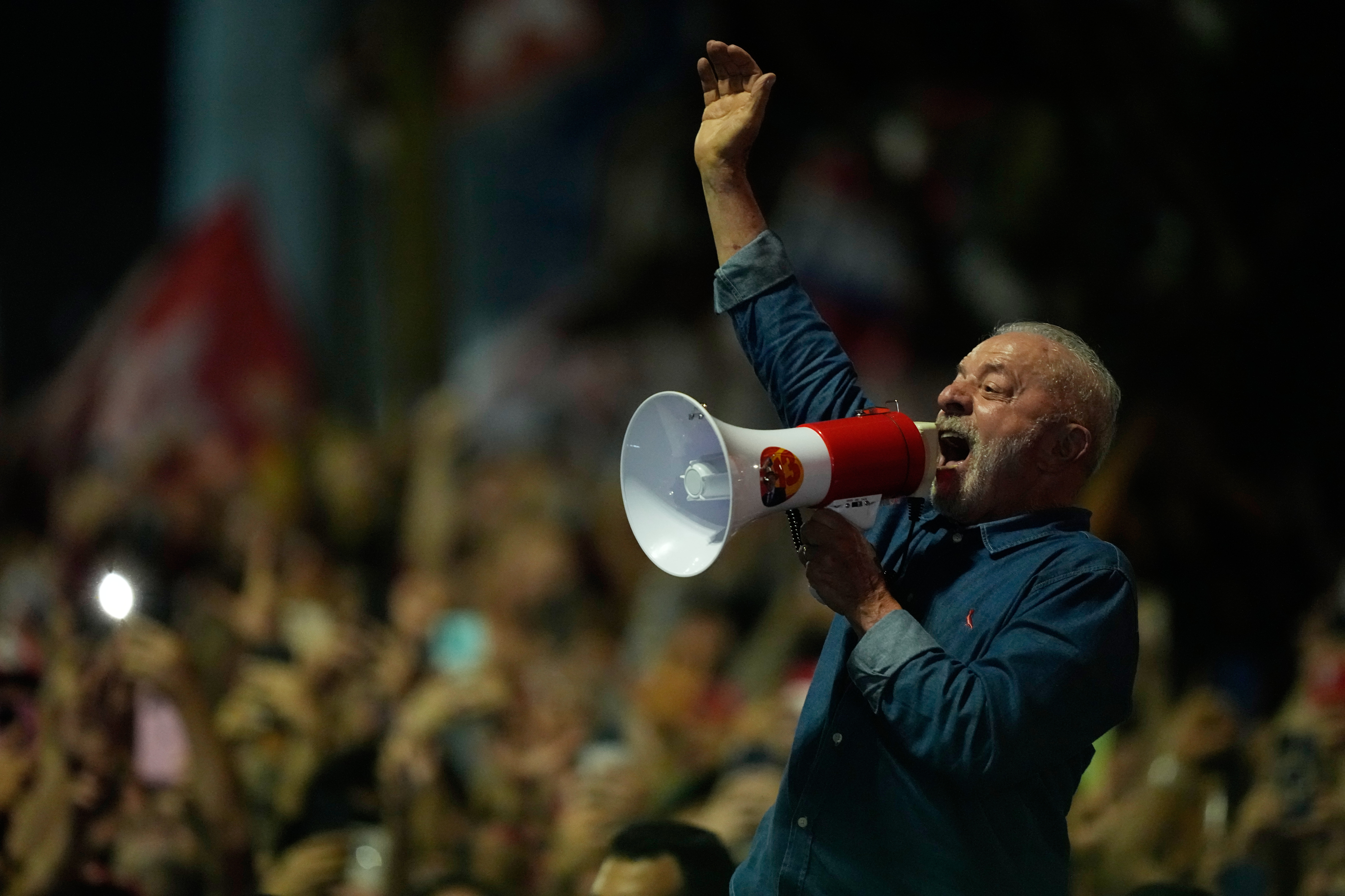 Lula, who turns 81 on Tuesday, joined the parade, leaning out of the sunroof of his car with a megaphone in his hand and his trademark rasp more hoarse than ever.