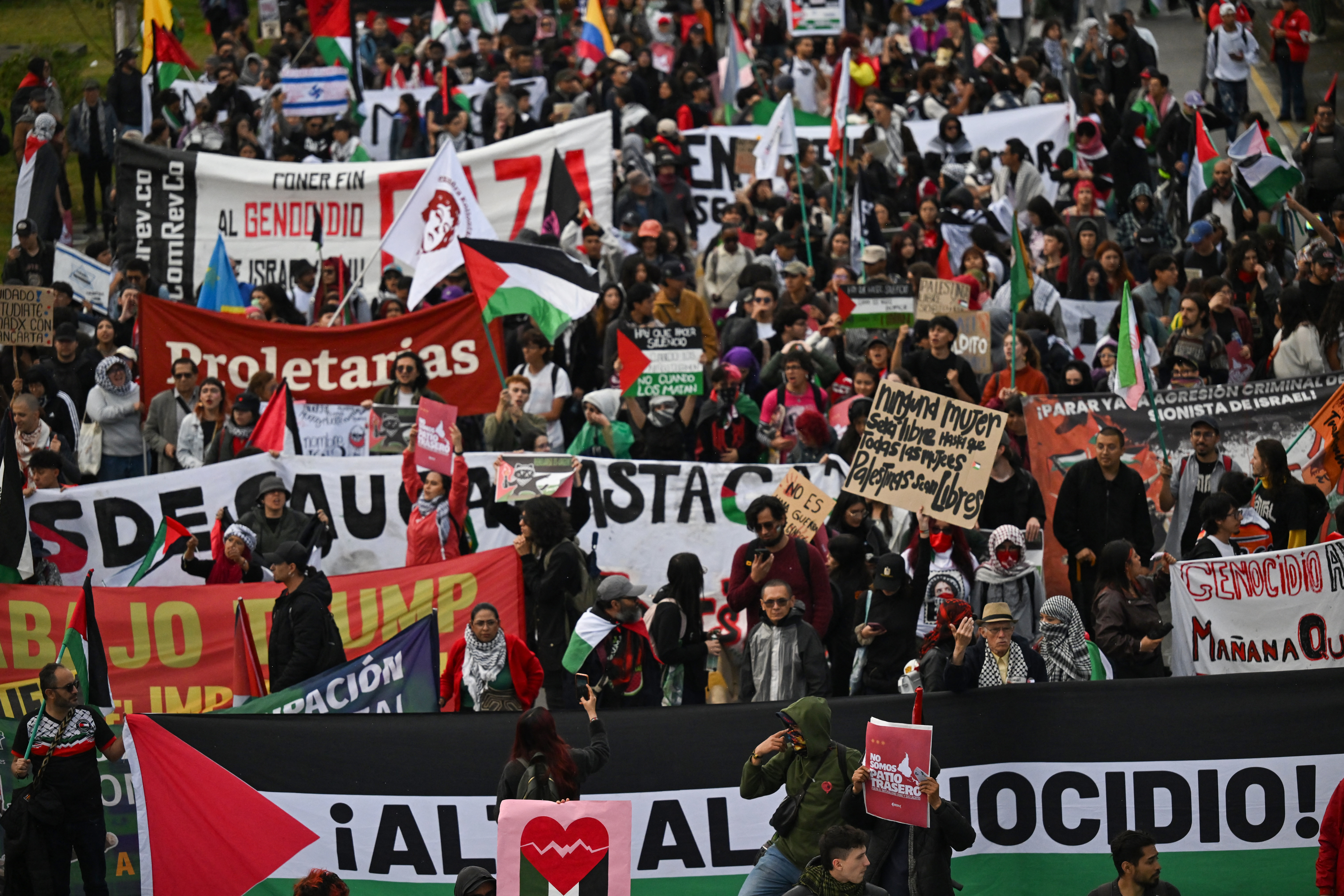 Demonstrators take part in a march in support of the Palestinian people, life and dignity in Bogota on October 7, 2026. (Photo by Raul ARBOLEDA / AFP)