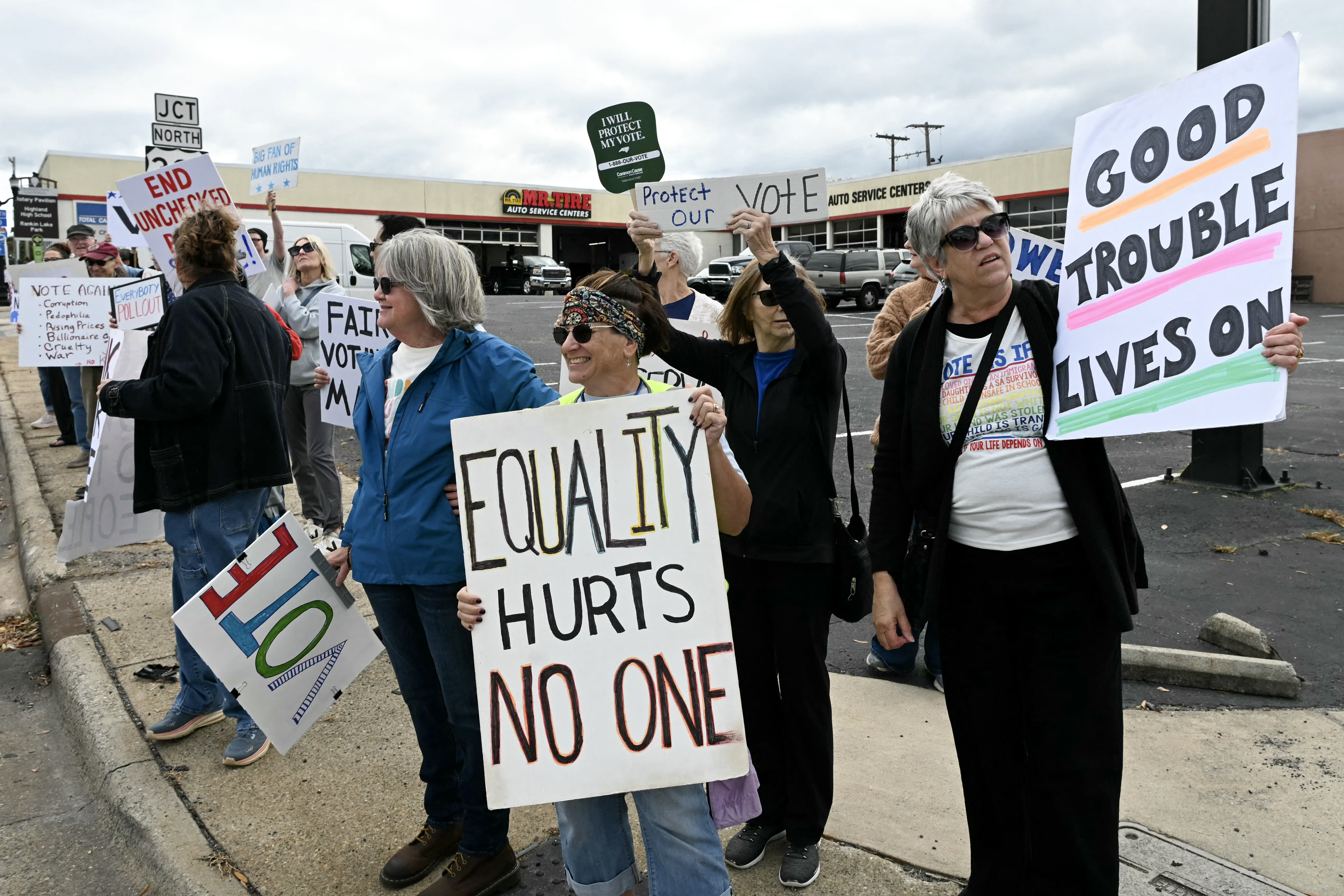 Demonstrators take part in a "No Kings: March to the polls" rally near St. Stephen's AME Zion church, in Gastonia, North Carolina, on October 17, 2026.