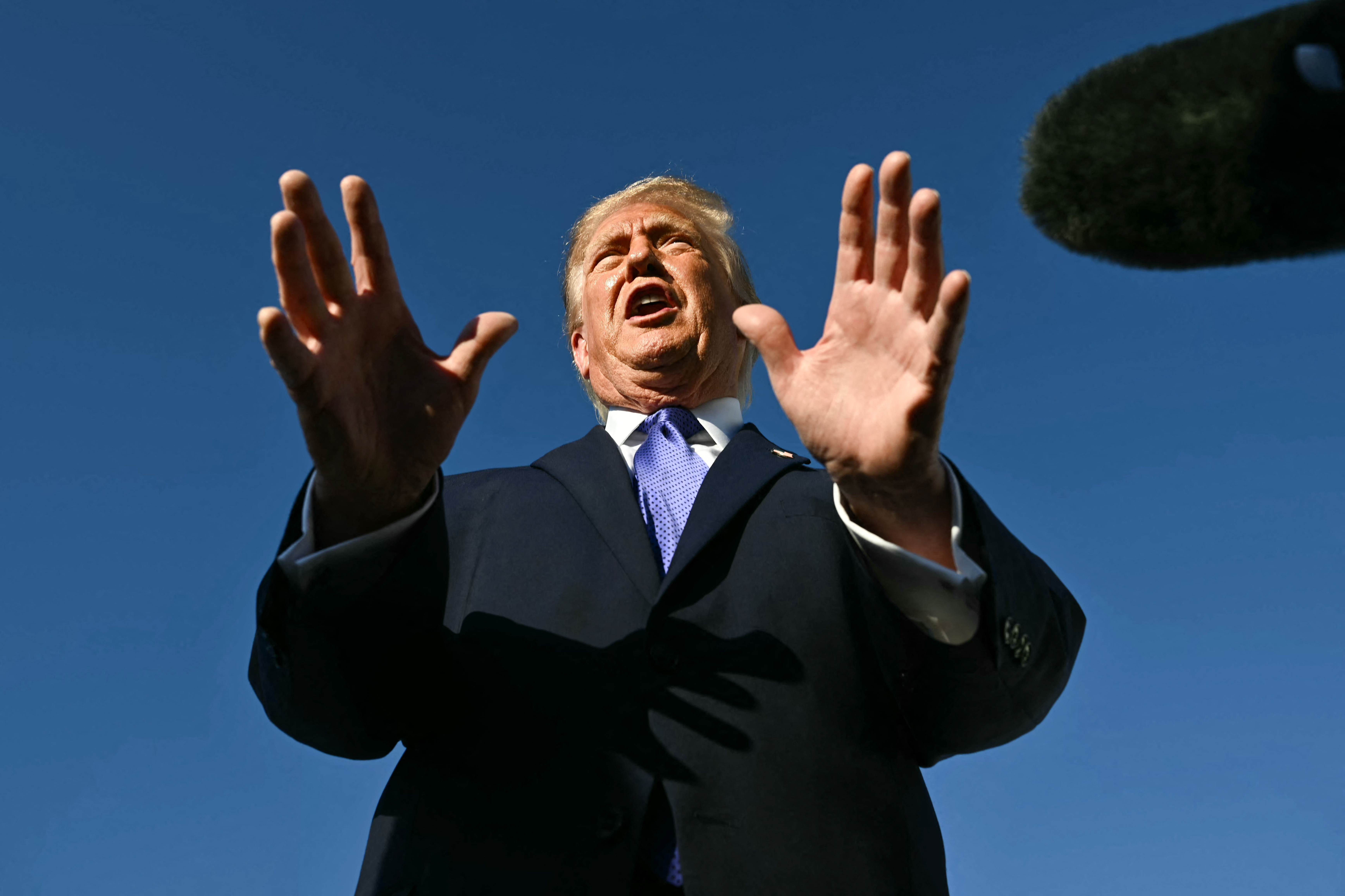 US President Donald Trump speaks to reporters after exiting Air Force One at Joint Base Andrews, Maryland on October 29, 2026.