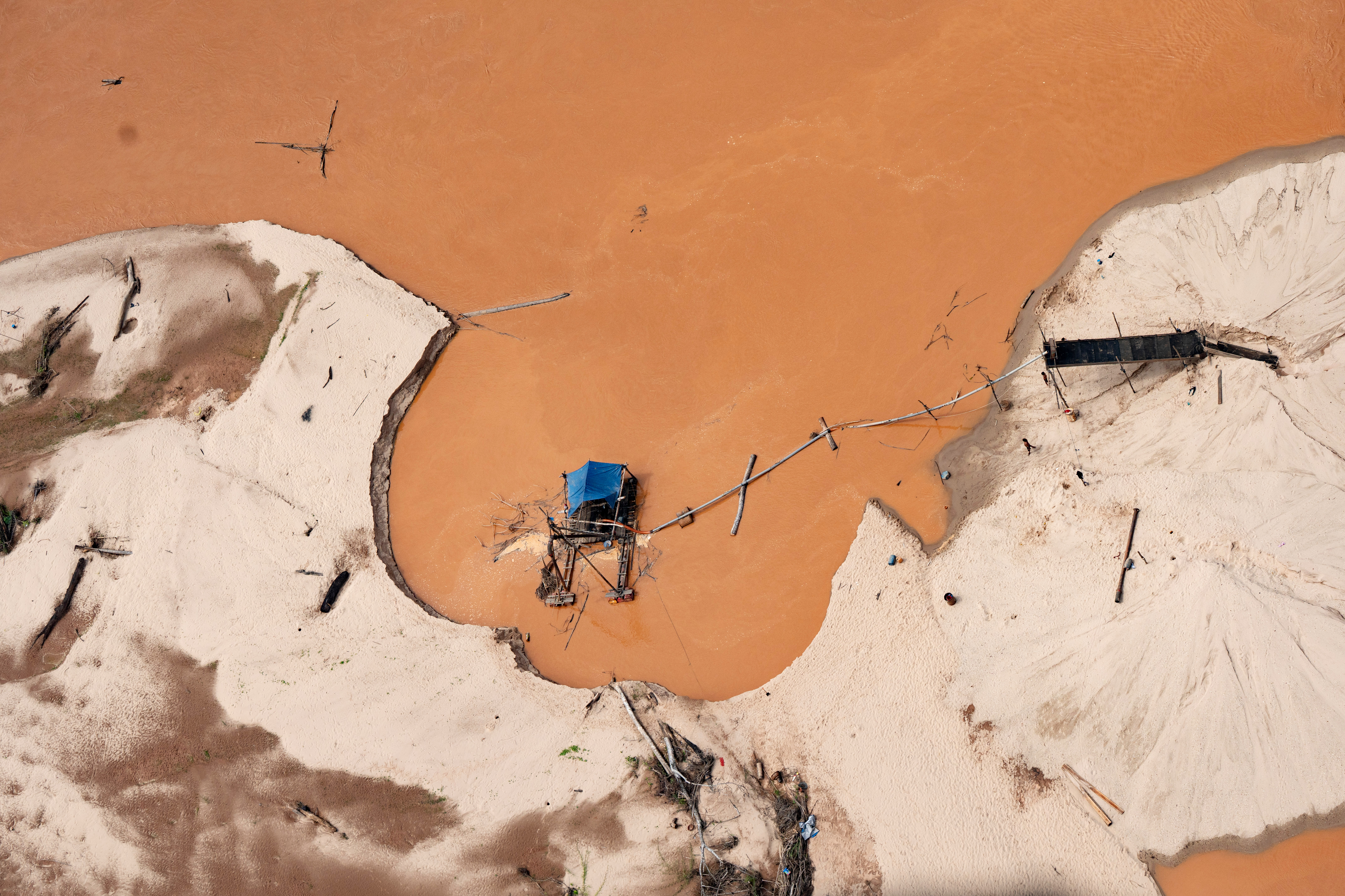FILE - A dredge used for illegal mining sits near the Tambopata National Reserve in Puerto Maldonado, Peru, Aug. 11, 2026. (AP Photo/Guadalupe Pardo, File)