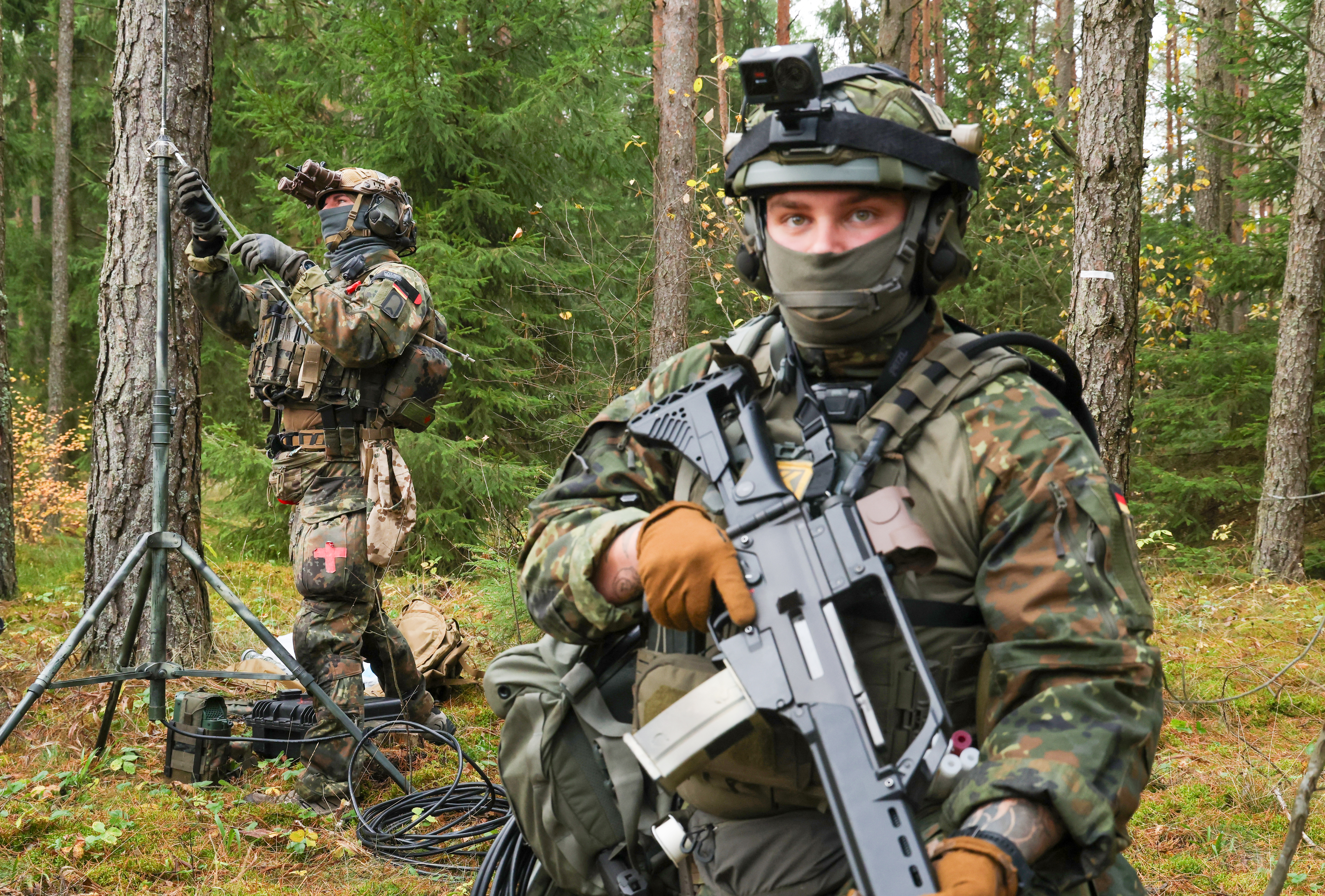 PALUKNYS, LITHUANIA - OCTOBER 28: Members of an electronic warfare unit of the Bundeswehr, the German armed forces, set up a Baumfalke system for locating enemy radio communications during the "Vigilant Owl" military exercise on October 28, 2026 near Paluknys, Lithuania. As tensions between the European Union and Russia continue to rise due to Russia's ongoing war in Ukraine, NATO and the three Baltic countries are strengthening regional defence and security capabilities. Lithuania is particularly vulnerable as it borders both the Russian exclave of Kaliningrad and pro-Russian Belarus. The Bundeswehr leads a NATO contingent of combat forces that is stationed in Lithuania. (Photo by Sean Gallup/Getty Images)
