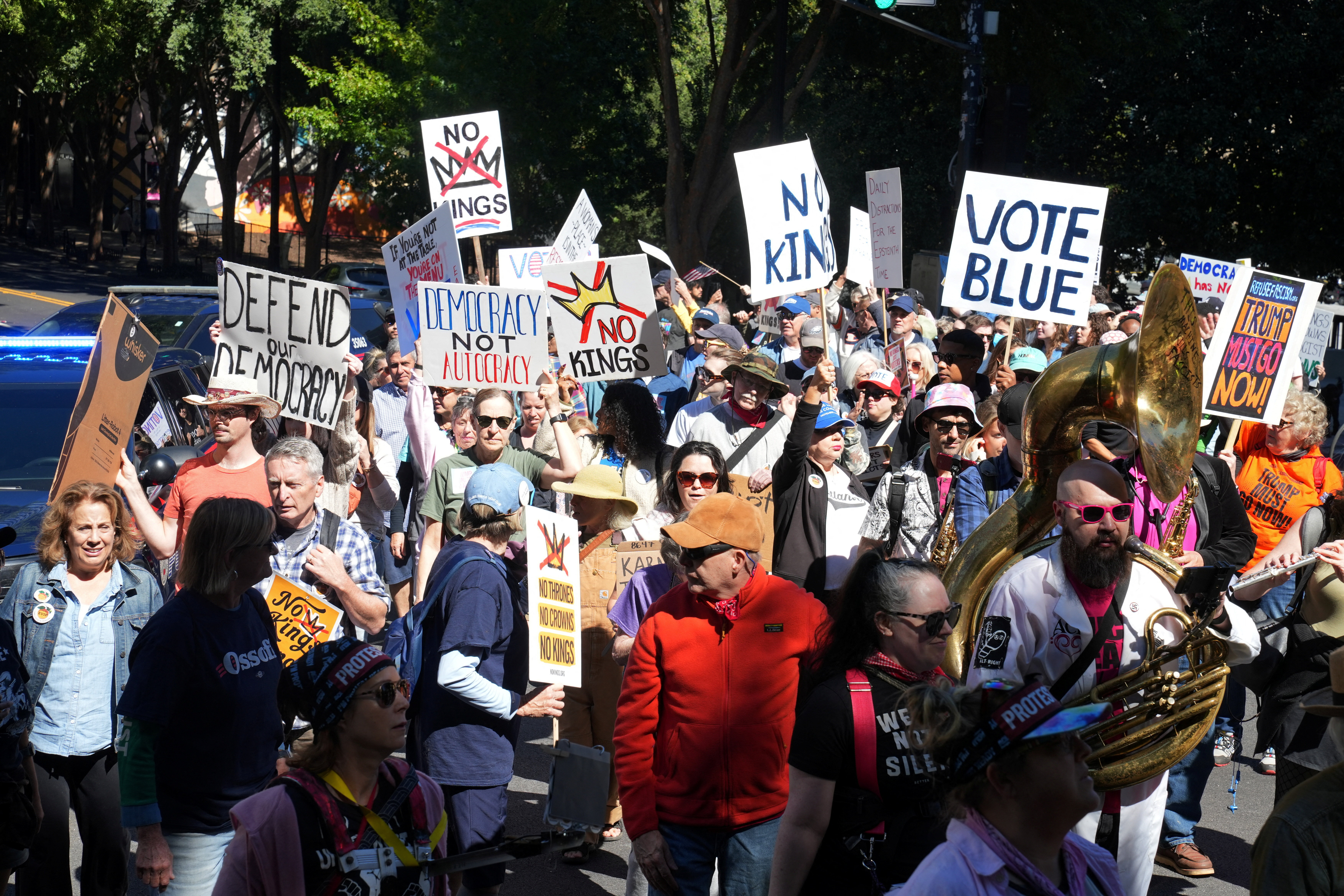 People take part in a "No Kings" protest as part of a nationwide day of action aimed at encouraging early voting ahead of the midterm elections in Atlanta, Georgia, US, October 17, 2026. REUTERS/Megan Varner