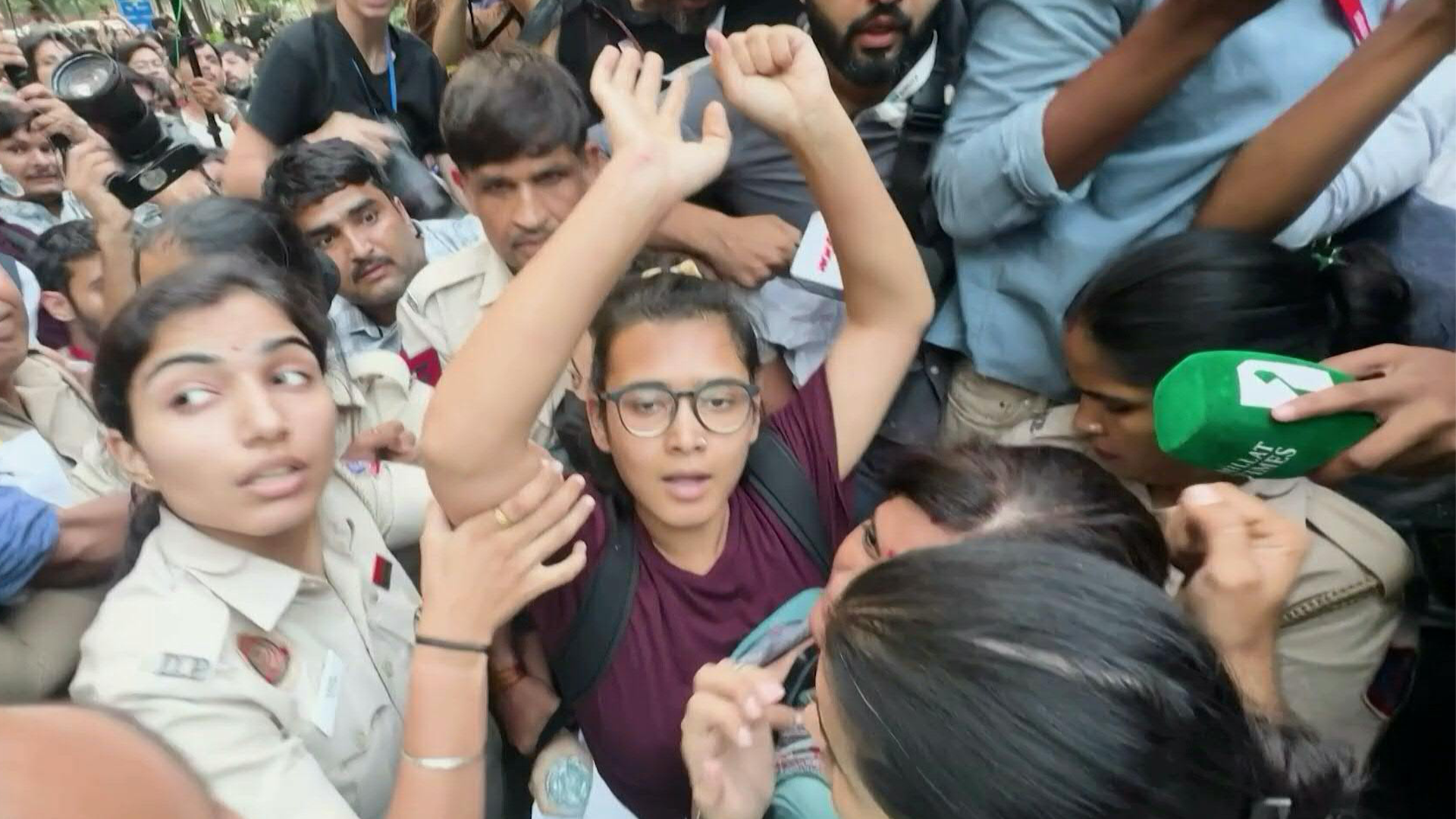 Indian student leader Neha Bora detained during flag march in New Delhi on October 16, 2026.
